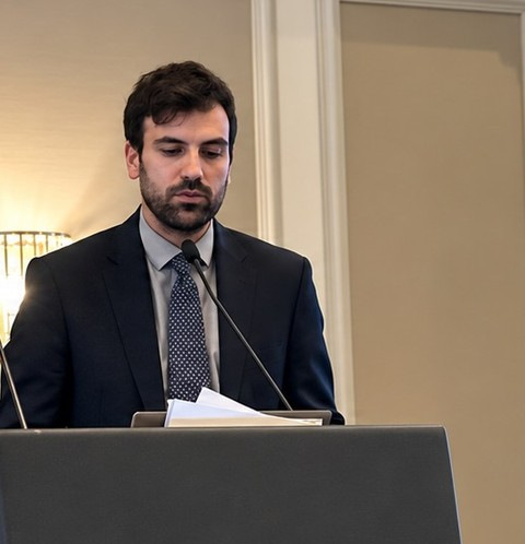 Conference speaker at the lectern